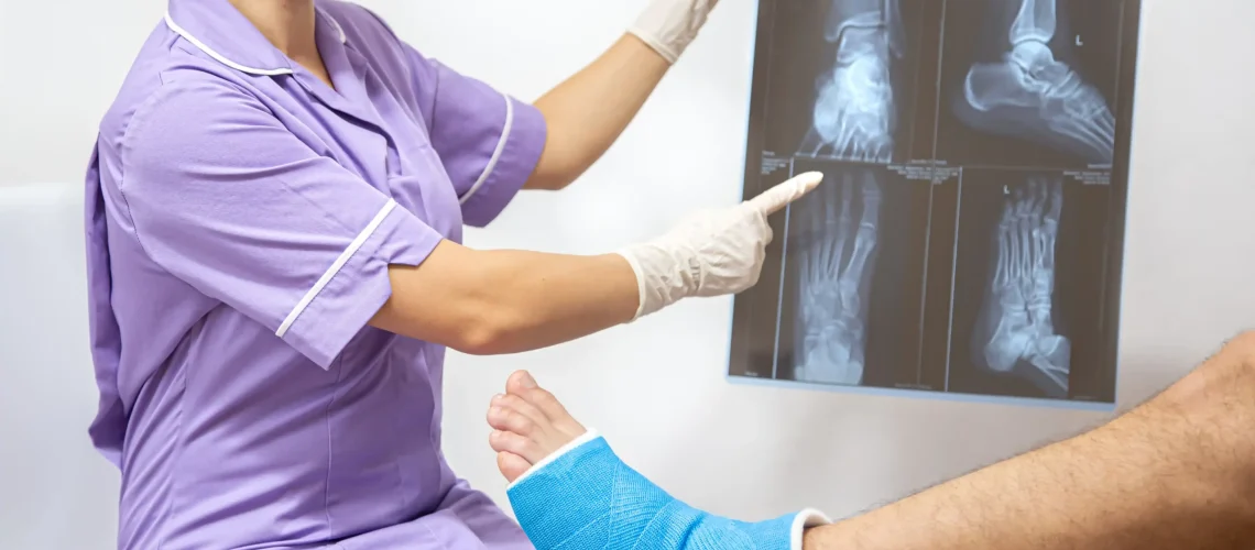 bone-fracture-foot-leg-male-patient-being-examined-by-woman-doctor-hospital copy